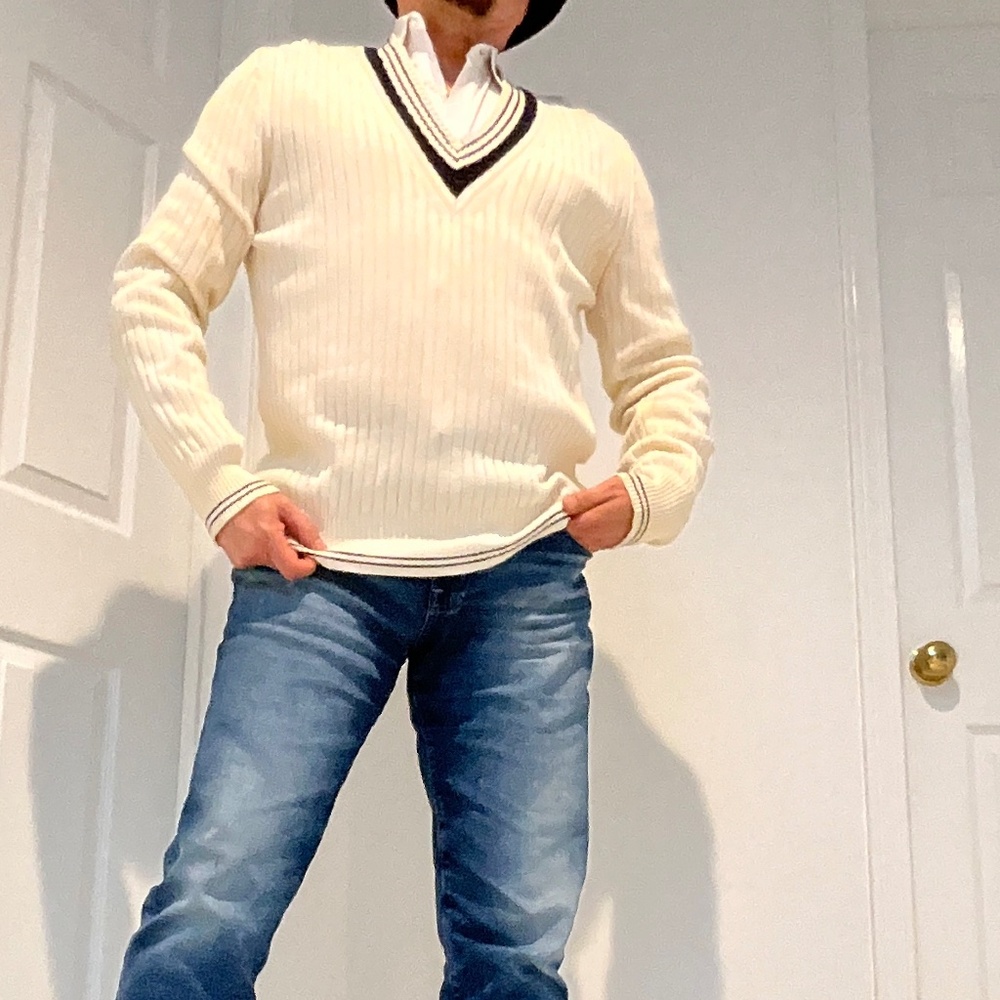 Mans V-neck pullover sweater. Valentino brand. Made in Italy.
